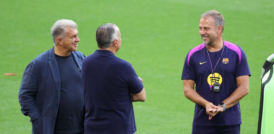 خوان لابورتا وهانسي فليك في جلسة تدريبية